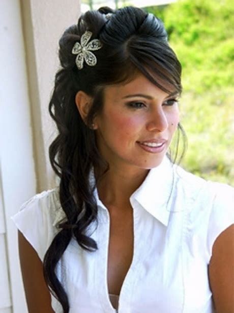 If you choose to go this route though, you're probably going to want to use a hair elastic. Graduation hairstyles for long hair