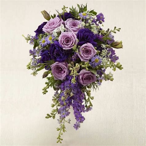 They are available in elegant bouquets of 50 roses, 100 roses, 200 roses, and 400 roses that are sure to make a special event even more memorable. Interflora Lavender Garden bouquet... Gorgeous! | Purple ...
