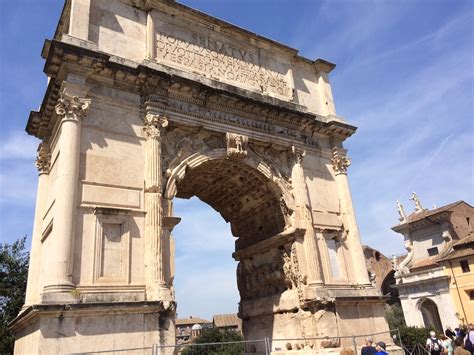The Arch Of Titus At The Entrance To The Ancient Roman Forum Rome