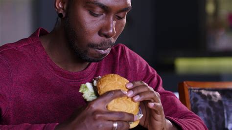 Happy Fat African American Man Eating Stock Footage Sbv