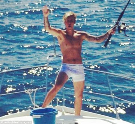 Justin Bieber Shows Off His Buff Body While Posing On Boat Daily Mail