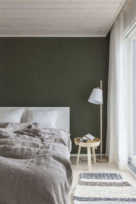 Create a cool, calm living space with olive green bedroom. Dark Green Paint | Scandinavian bedroom color, Green ...