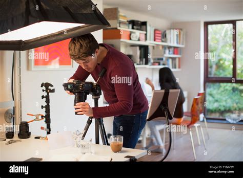 Male Photographer Working In Studio Stock Photo Alamy