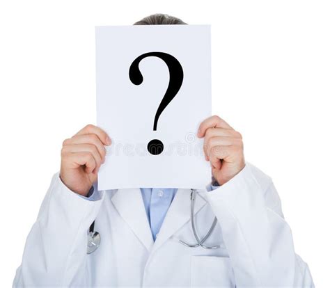 Portrait Of Doctor Holding Paper With Question Mark Stock Image Image