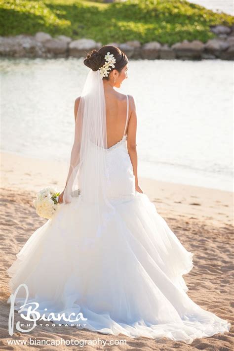 A birdcage veil will be great as a beach wedding veil as it is understated and will not blow around in a breeze. A floral veil is the perfect way to accessorize for a ...