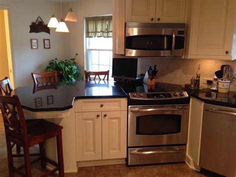 Black stainless steel is bold and sexy, but does it have staying power? My kitchen: off white cabinets, stainless steel appliances ...