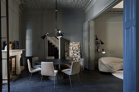 Dark Interior With A Wood Panelled Kitchen Coco Lapine Designcoco