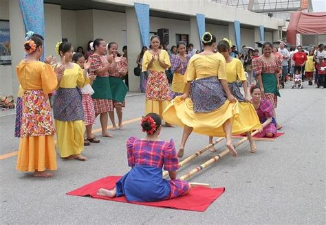 Tinikling The National Dance Of The Philippines With Bamboo Poles