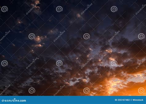 Scenic Shot Of The Evening Golden Sunset Sky Illuminating Clouds Stock