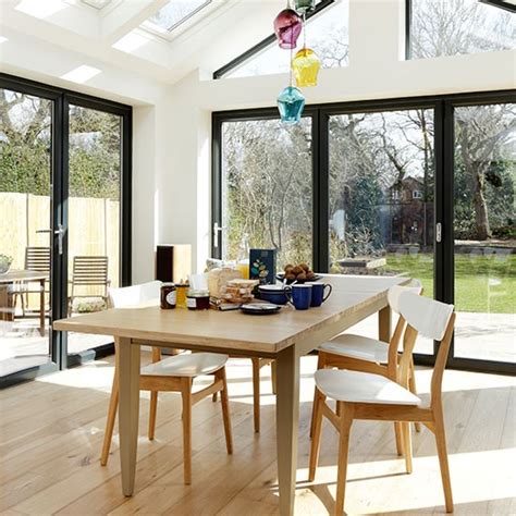 Amazing conservatory, orangery and sunroom images. Conservatory dining area with oak flooring | Conservatory ...