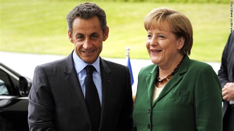 Merkel And Sarkozy Huddle As Euro Struggles