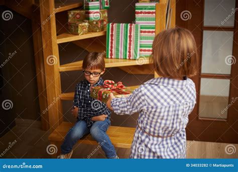 Spoiled Kid Refusing A Christmas Present Stock Photo Image Of