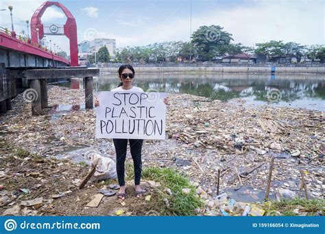 Female Protesters With Text Of Stop Plastic Pollution Stock Photo