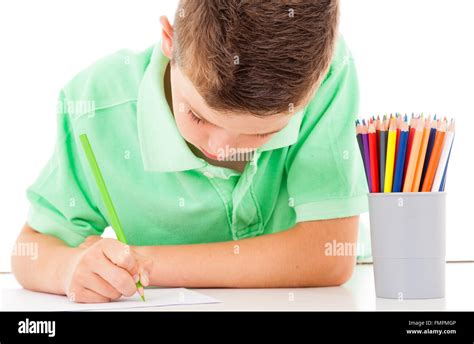 Schoolboy Drawing With A Pencil On White Background Stock Photo Alamy
