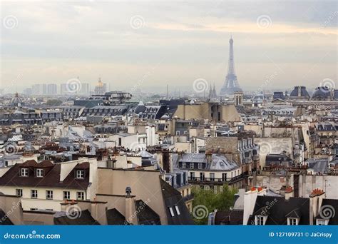 Aerial View Of Eiffel Tower On A Rainy Day Over City Line Of Par Stock