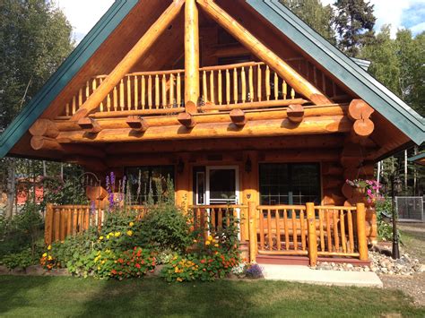 Nestled into a private wooded waterfront setting with the luxury of hot water, indoor plumbing, and comfortable queen beds, our log cabin retreat is a real alaskan experience witho… Noon sunshine (With images) | House styles, Log homes