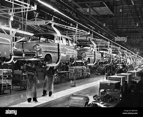 This Image Depicts A Factory In The Automobile Industry In The 50s The
