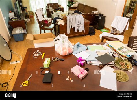 Messy Living Room With Clothes And Other Stuff Stock Photo Alamy