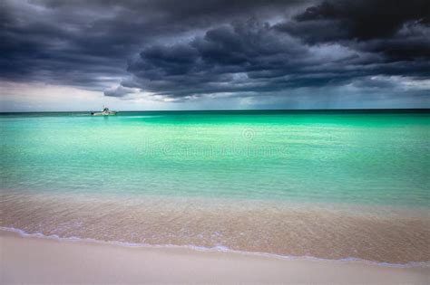 Tropical Caribbean Beach with Storm Clouds in Montego Bay, Jamaica ...