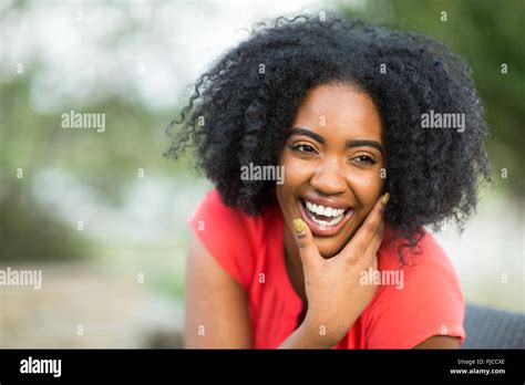 Multi Ethnic Group Of Women Laughing And Talking Stock Photo Alamy