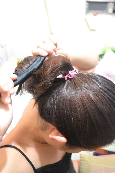 Elegant woman donut ponytail synthetic hair pieces and buns big hair messy dish bun chignon average rating: A Lovely Treat: How to make donut hair bun