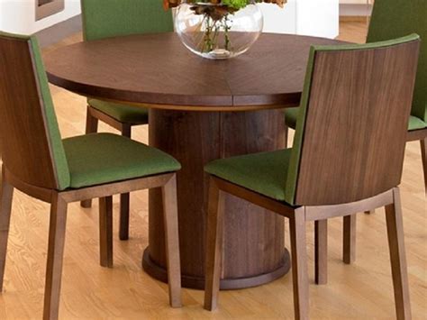 If you have a large family or entertain a lot consider a rectangular table because you can create more seating and space with a rectangular table. 20 Best Collection of Circular Extending Dining Tables and ...