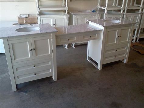 Double vanity in white with marble vanity top in carrara white and 24 in. Vanity with makeup area | Double vanity bathroom, Bathroom ...