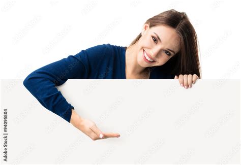Brunette Woman In Casual Clothing Showing Blank Signboard Stock Foto Adobe Stock