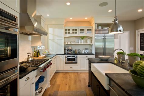 Simple clean lines and attention to detail. Kitchen with Antique White Cabinets and Black Island with ...