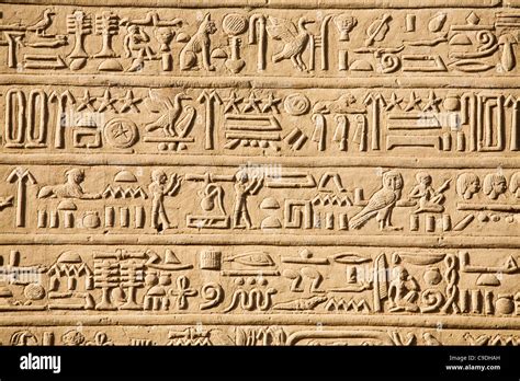 Egypt Hieroglyphics Carved Into Wall Of Temple Of Horus And Sobek At