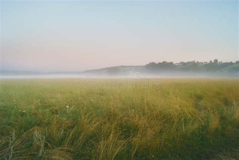 Sunrise And Morning Mist Over Pasture And Hills Stock Photo Image Of
