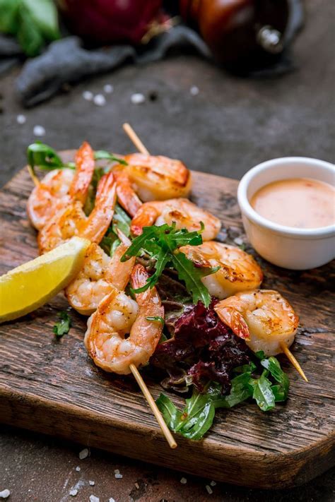 To prepare the grilled shrimp appetizer place the shrimp in a mixing bowl, drizzle olive oil and season with the fajita seasoning, place on a pyrex or baking sheet and grill for few minutes on high using your oven. Spicy Grilled Shrimp Skewers | Spicy grilled shrimp, Spicy ...
