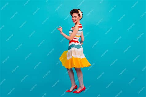 Free Photo Studio Shot Of Pinup Girl Wearing Striped Dress Full