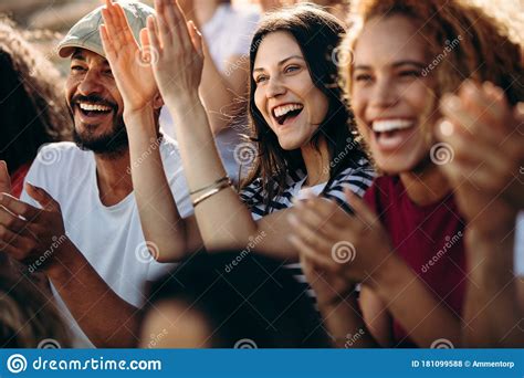 Group Of Spectators Cheering For Their Team Victory Stock Photo Image