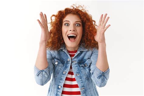 Excited Amused Attractive Stylish Redhead Woman Raising Hands Up