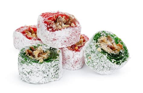 Premium Photo Green Turkish Delight With Nuts On Powdered Sugar