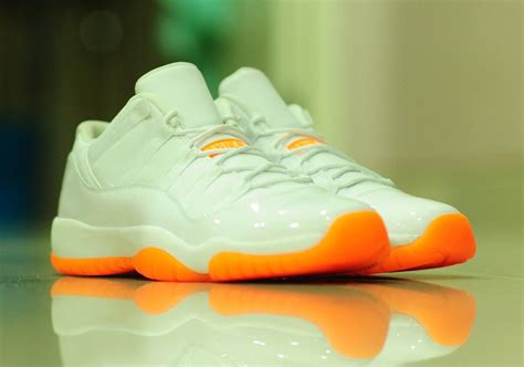 Bright patent white all up top, whole a zesty orange hue holds the outsole hostage. Jordan 11 Low Citrus Sizing Info | SneakerNews.com