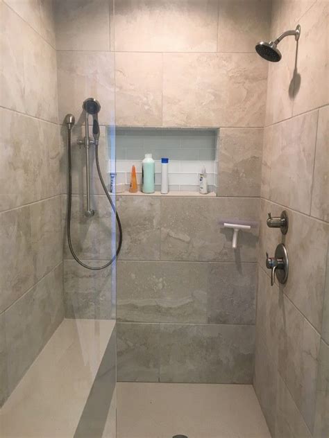 Check spelling or type a new query. Corian shower base and seat. Large Porcelain tiles ...