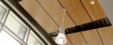 Installation of wall panels on adjustable wooden frame. Acoustigreen | Acoustical Wood Panels for Ceilings and Walls