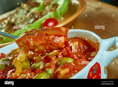 Mediterranean Baked Fish Recipe With Tomatoes And Capers Stock Photo