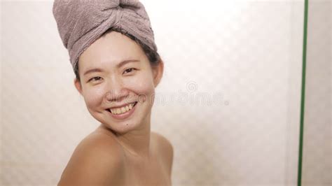 Young Beautiful And Happy Asian Chinese Woman With Head Wrapped In