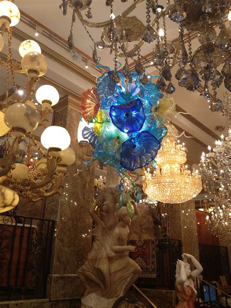 Its graceful design features cut glass with a classic bronze finish. Colorful glass light fixtures | Glass light fixtures ...