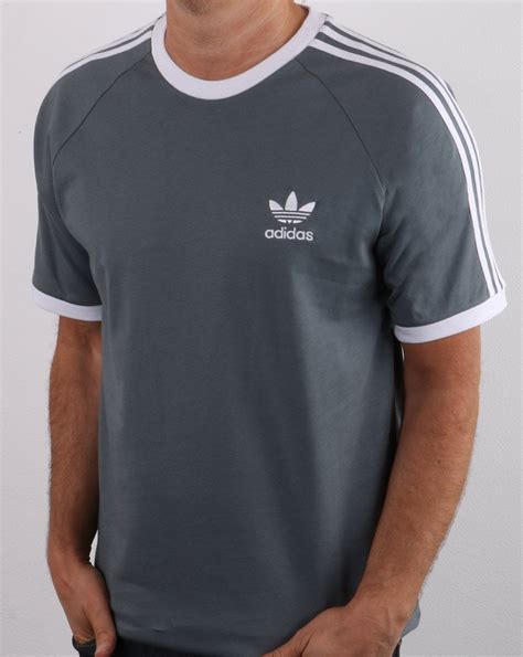 Adidas has been a staple in shirt for decades. Adidas Originals 3 Stripes T Shirt Slate Grey | 80s Casual ...