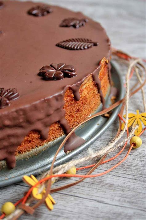 Add more sugar if necessary and beat on medium for. Homemade Baumkuchen Cake with Chocolate Icing Recipe | Foodal