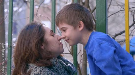 Son And Mom Kissing Mother Kiss Her Son Outdoor Stock Adobe Stock