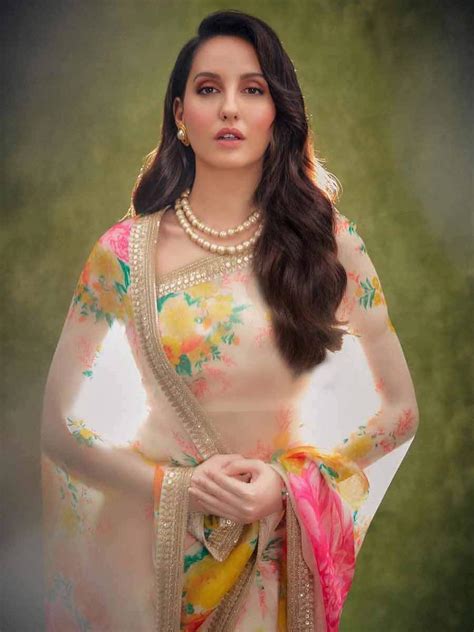 Nora fatehi is a canadian dancer, model, actress and singer who has mainly appeared in hindi films. Nora Fatehi looks stunning in beachwear in her latest video | Filmfare.com