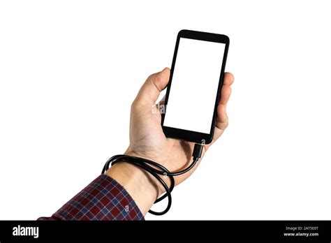 Modern Problems Concept Holding A Smartphone With Usb Cable Tied