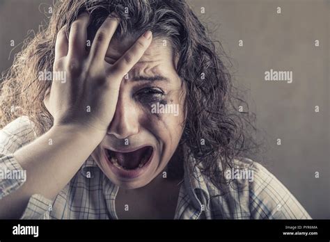 Crying Girl Closeup Of A Young Woman Desperately Crying Stock Photo
