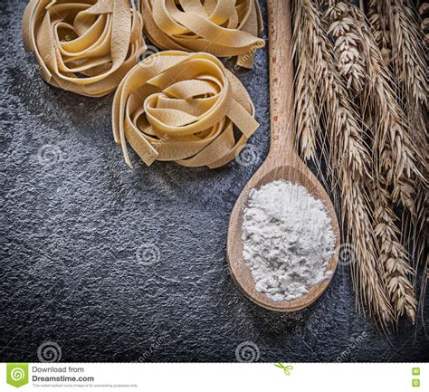 Ripe Wheat Rye Ears Wood Spoon Flour Uncooked Pasta On Black Bac Stock