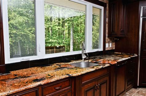 Quartz can also be a great material for sinks. Magma Gold Granite - Traditional - Kitchen - DC Metro - by ...